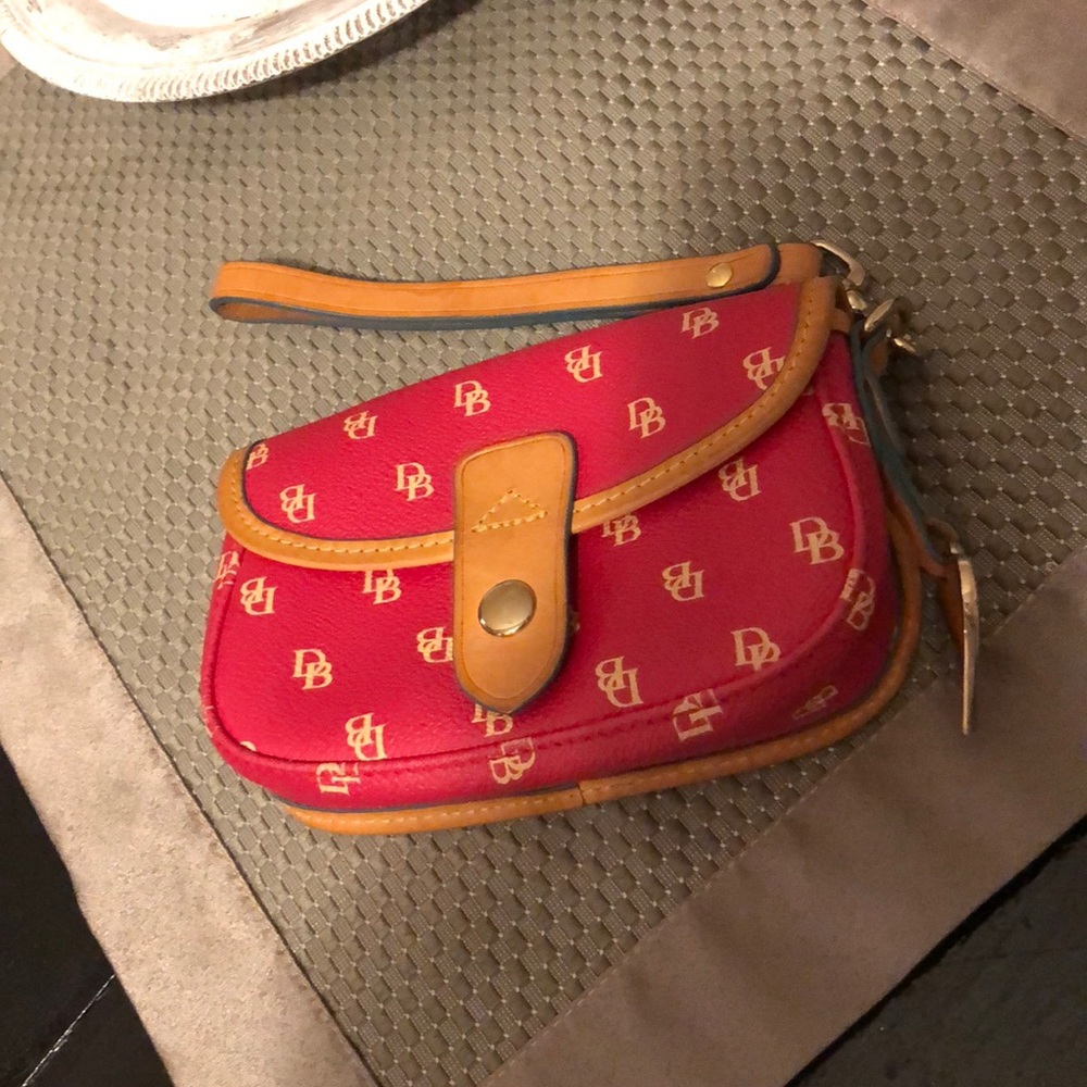 Authentic Dooney and bourke bright pink wristlet